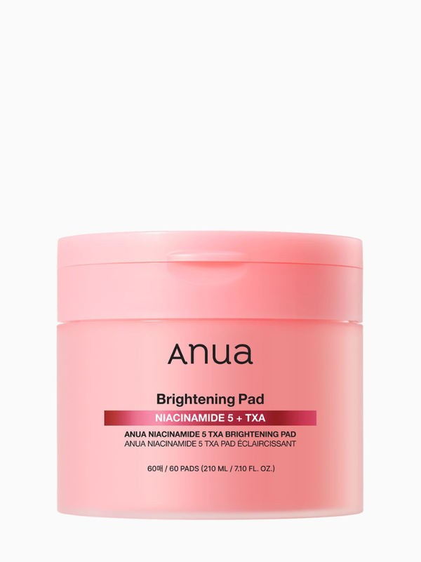 Anua Niacinamide 5 TXA Brightening Pad jar showing pink-tinted crescent-shaped toner pads designed to perfectly fit the under-eye and cheekbone curves.