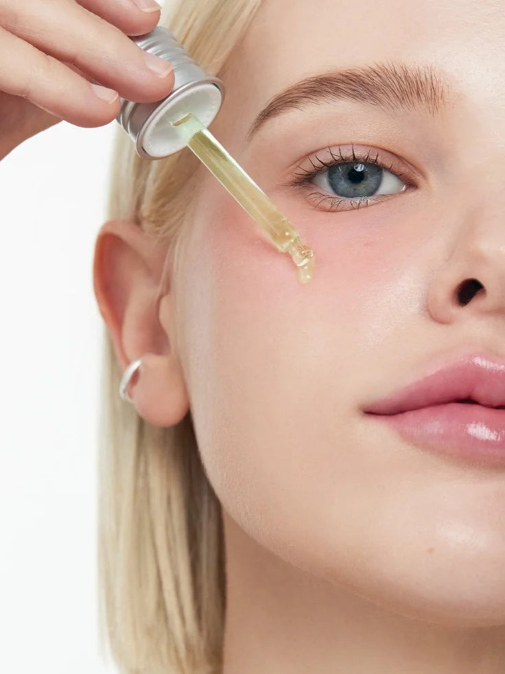 Anua Azelaic Acid 10% serum bottle on a clean vanity, symbolizing a gentle skincare routine.
