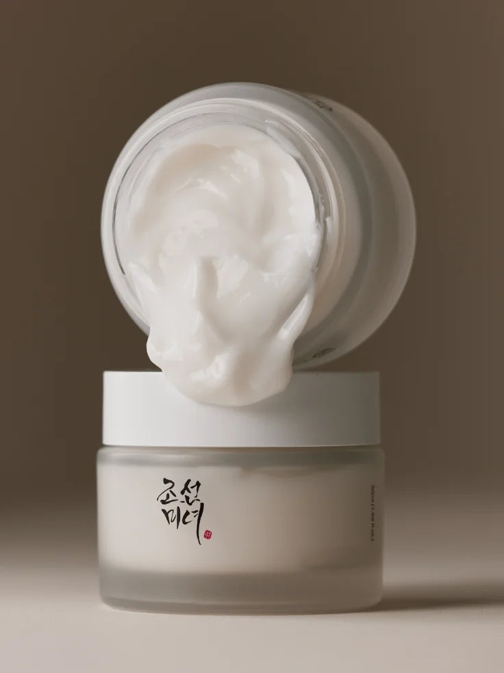 Beauty of Joseon Dynasty Cream highlighting its smooth, creamy consistency and dewy finish on the skin."
