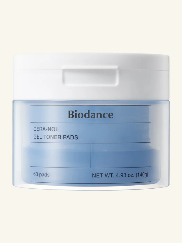 Biodance Vita Niacinamide Gel Toner Pads 60ea jar displayed on a bright, radiant background showcasing its signature yellow packaging.