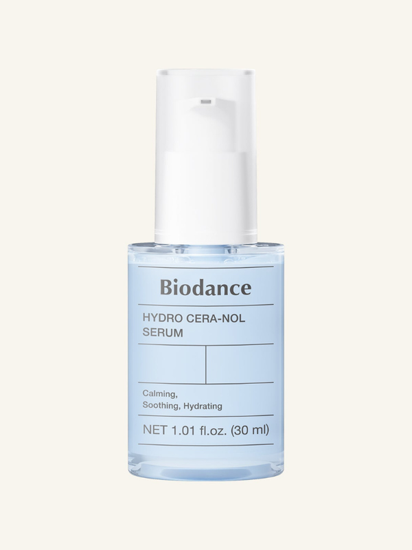 Biodance Hydro Cera-nol Serum bottle highlighting its milky, fast-absorbing soothing formula for damaged skin barriers.