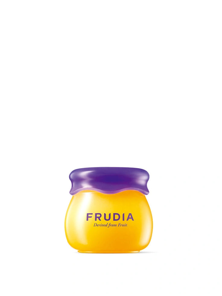 Frudia Blueberry Hydrating Honey Lip Balm with lid open, revealing its nourishing formula.