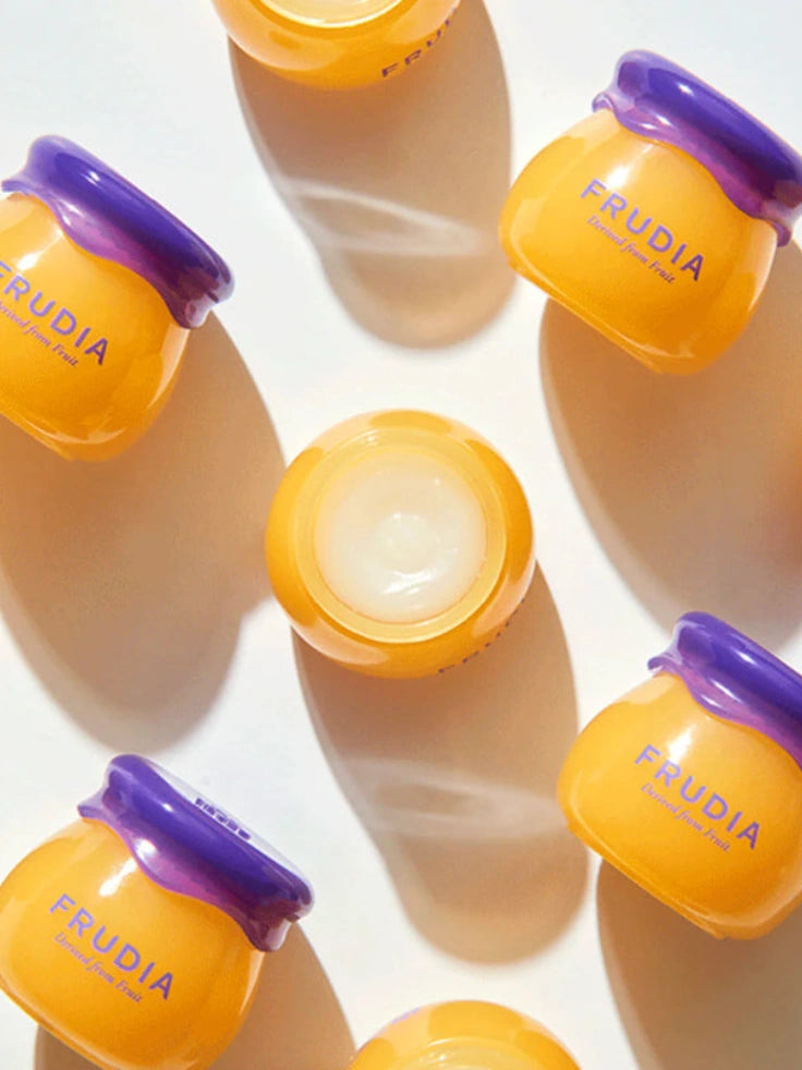 Close-up of Frudia Blueberry Hydrating Honey Lip Balm's rich, jam-like texture.