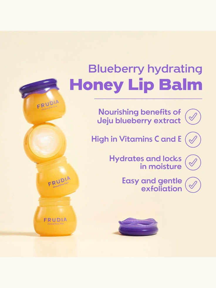 Frudia Blueberry Hydrating Honey Lip Balm applied on lips, showcasing a smooth and supple finish.