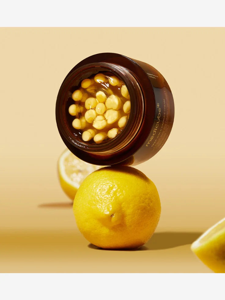 Medicube Deep Vita C Capsule Cream - Visual representation of Vitamin C capsules and Sea Buckthorn Extract in the formula.