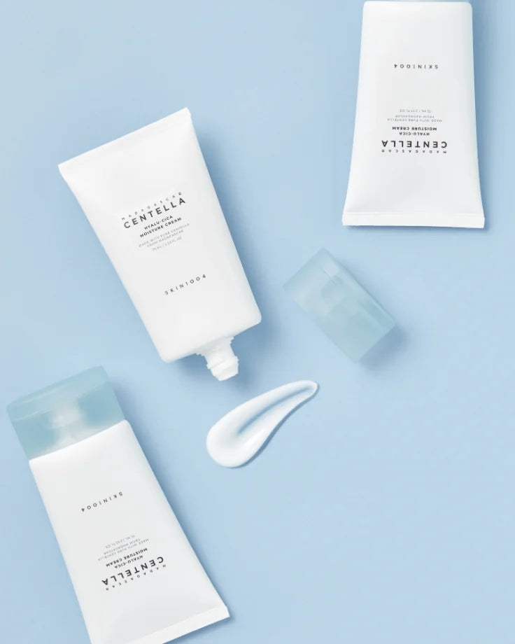 The SKIN1004 Hyalu-Cica Cream tub and its box, showcasing the EWG Green Grade certification and artificial fragrance-free claim.