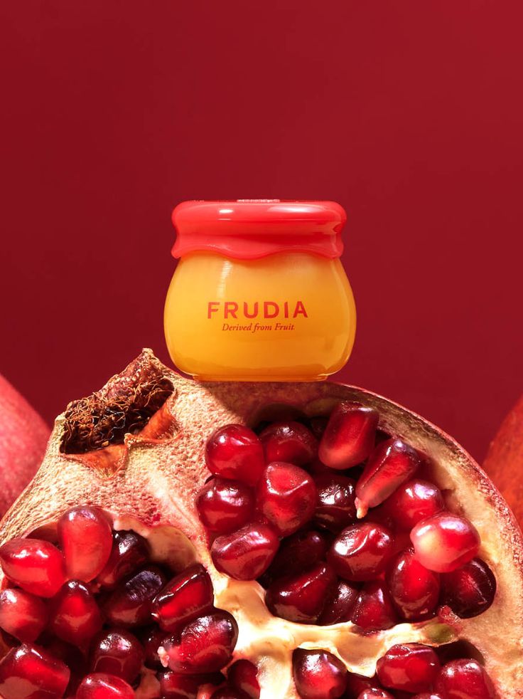 Frudia Pomegranate Honey 3 in 1 Lip Balm 10ml with Pomegranate fruits photo