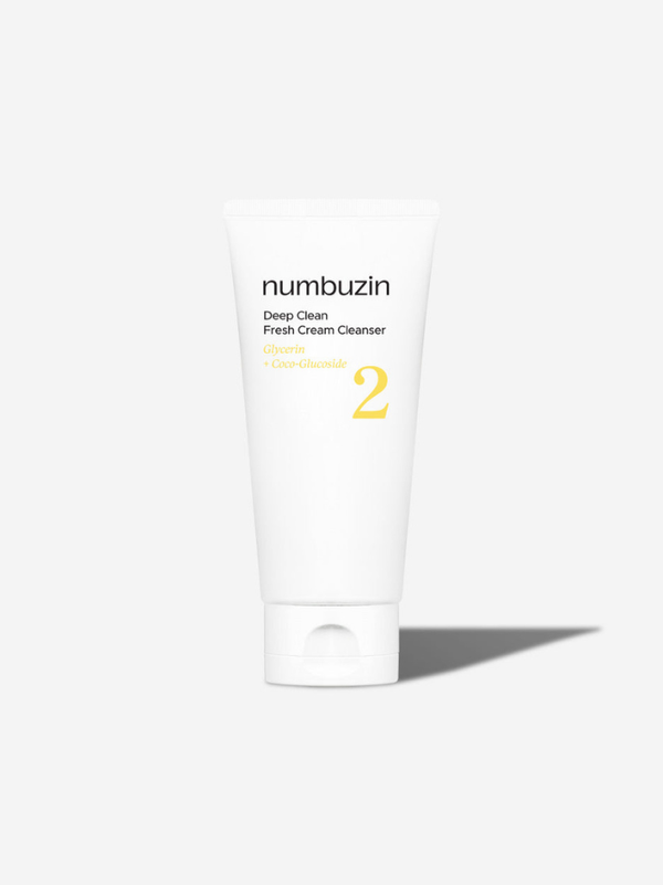 numbuzin No. 2 Deep Clean Fresh Cream Cleansing Foam 120ml tube on a splash of water.